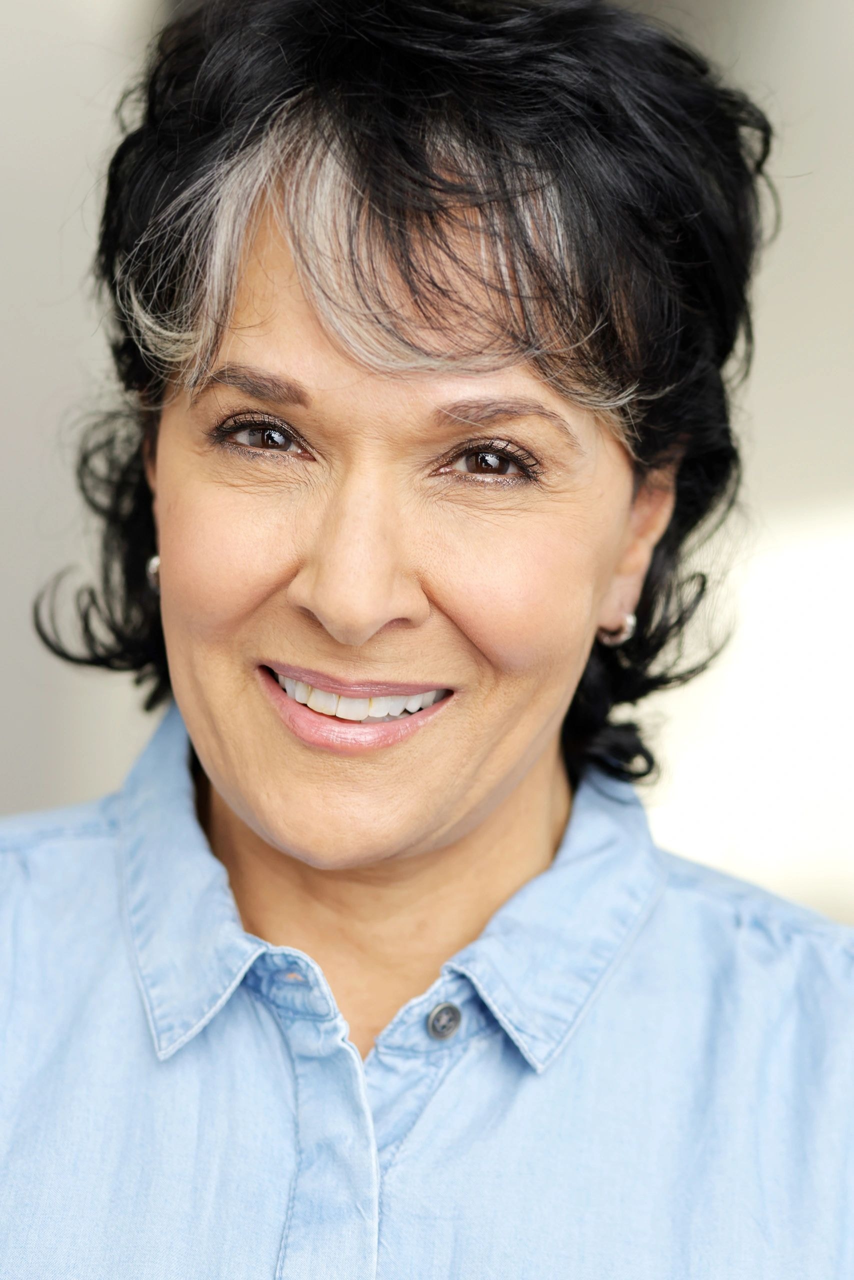Gloria Coco headshot – three quarter